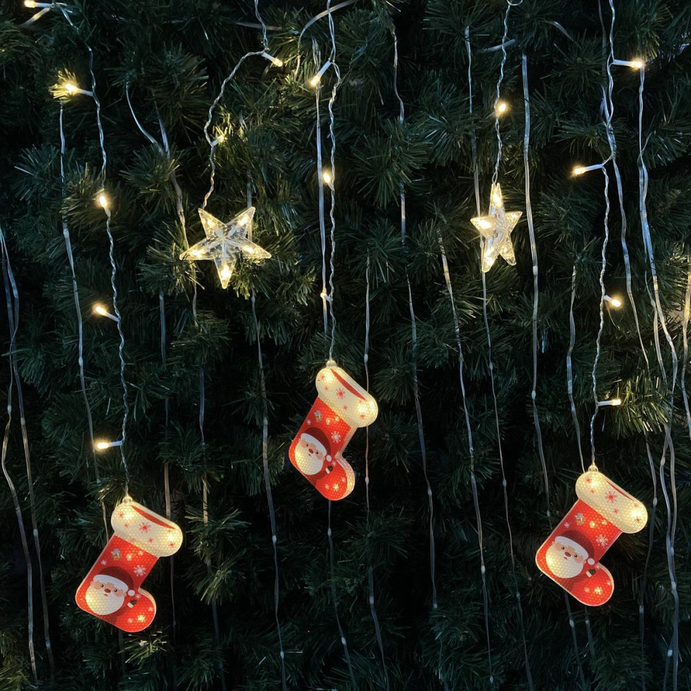 Luces navideñas amarillas con botas